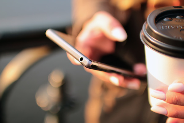coffee-hands-mobile-phone-4831 Google’s Mobilegeddon: The Best Excuse to Repurpose Old Content
